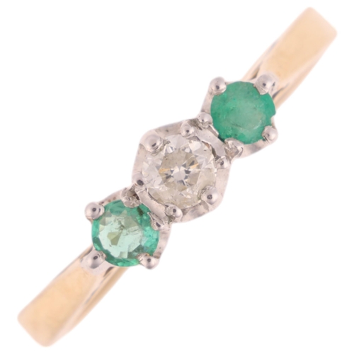 1365 - A 9ct gold three stone emerald and diamond ring, setting height 4.2mm, size M, 1.7g