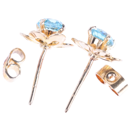 1369 - A pair of 9ct gold blue zircon flowerhead stud earrings, 9.4mm, 1.6g