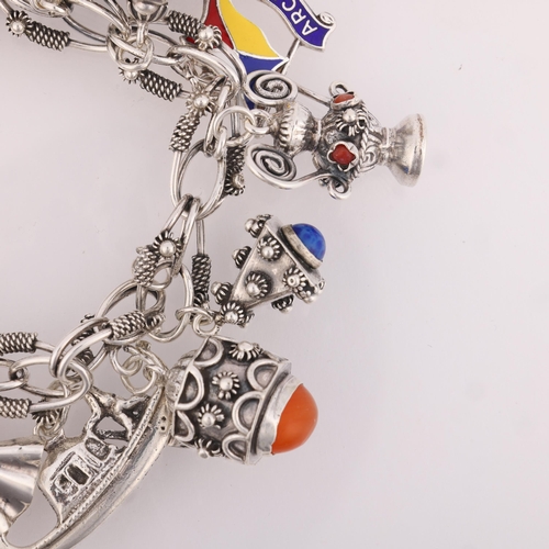 1456 - A Vintage Continental silver fancy link charm bracelet, with various 800 silver charms, 16cm, 71.4g