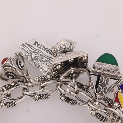 1456 - A Vintage Continental silver fancy link charm bracelet, with various 800 silver charms, 16cm, 71.4g