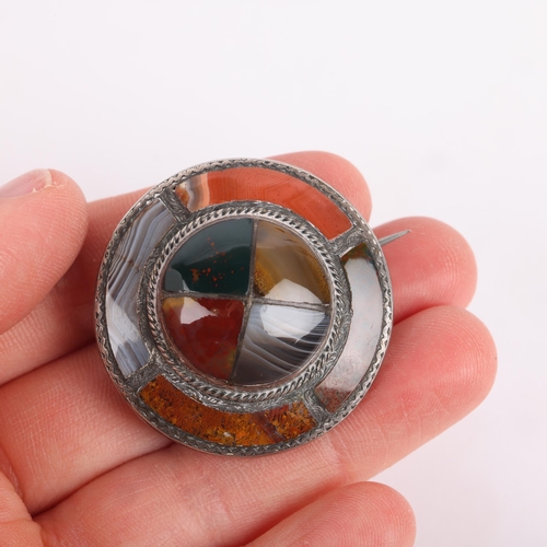 1464 - A 19th century Scottish hardstone shield brooch, unmarked silver set with banded agate bloodstone ja... 