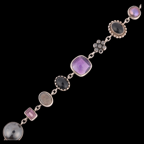 1470 - A sterling silver gem set line bracelet, indistinct maker, gemstones include hematite amethyst onyx ... 