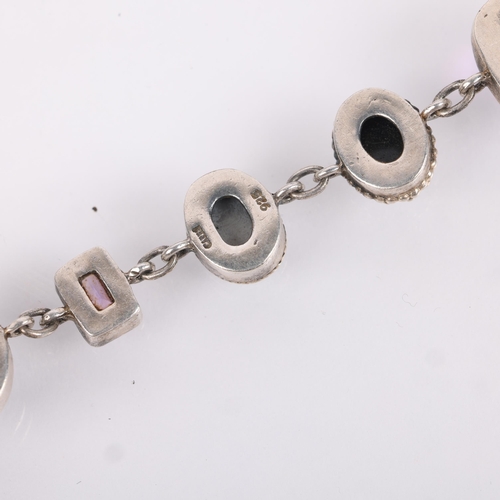 1470 - A sterling silver gem set line bracelet, indistinct maker, gemstones include hematite amethyst onyx ... 