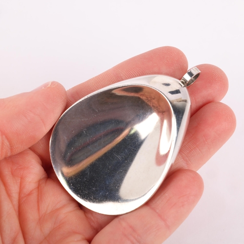 1473 - GEORG JENSEN - a Danish modernist sterling silver 'Oyster' pendant, designed by Nanna & Jorgen Ditze... 