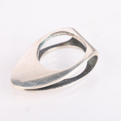 1477 - SVEN HAUGAARD - a Danish modernist sterling silver geometric abstract ring, of wrap-around form, len... 