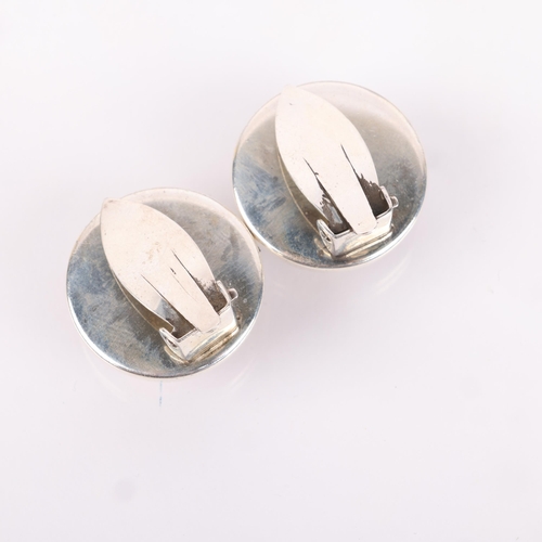 1488 - NIELS ERIK FROM - a pair of Danish modernist sterling silver tigers eye clip-on earrings, plain circ... 