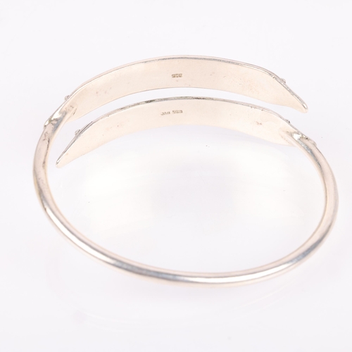 1491 - JENS JOHS AAGAARD - a Danish sterling silver Viking Revival torque bangle, setting height 23.7mm, in... 