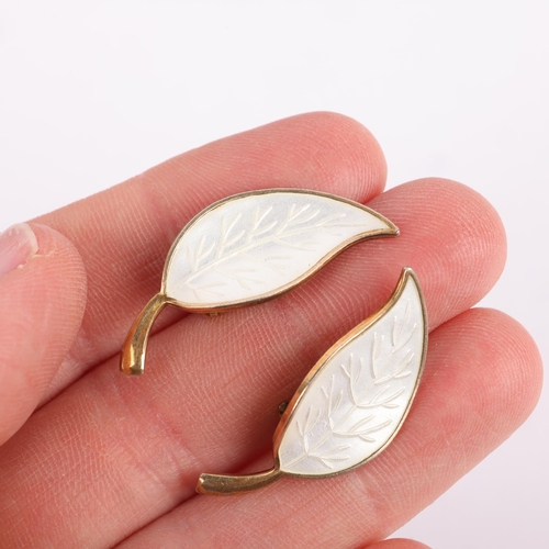 1497 - MEKA - a pair of Danish modernist sterling silver-gilt white enamel leaf clip-on earrings, 32mm, 5.3... 