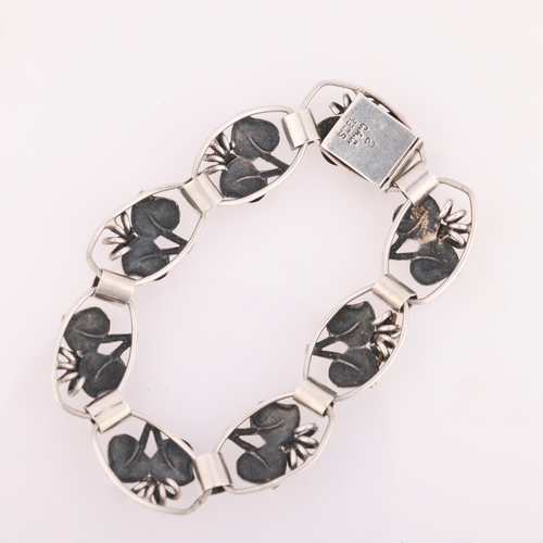 1523 - C A CHRISTENSENS EFTF - an Art Deco Danish silver floral panel bracelet, band width 14.9mm, 19.5cm, ... 