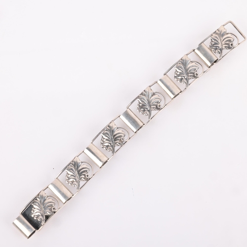 1524 - K LYKKE P - an Art Deco Danish silver floral panel bracelet, band width 17.9mm, 19cm, 21g