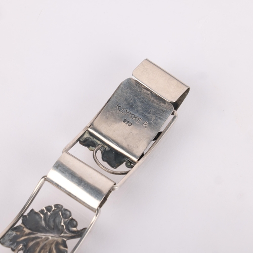 1524 - K LYKKE P - an Art Deco Danish silver floral panel bracelet, band width 17.9mm, 19cm, 21g