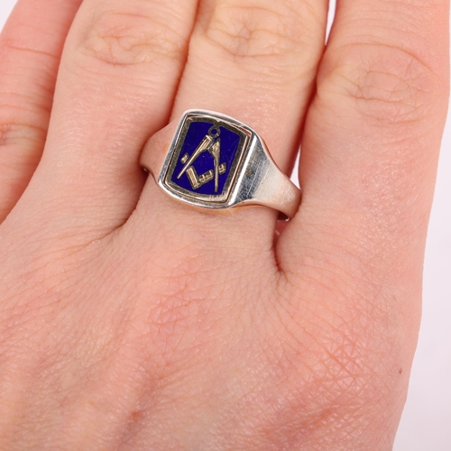 1535 - A silver-gilt enamel Masonic signet ring, maker JHW, Birmingham 1989, setting height 7.4mm, size V, ... 