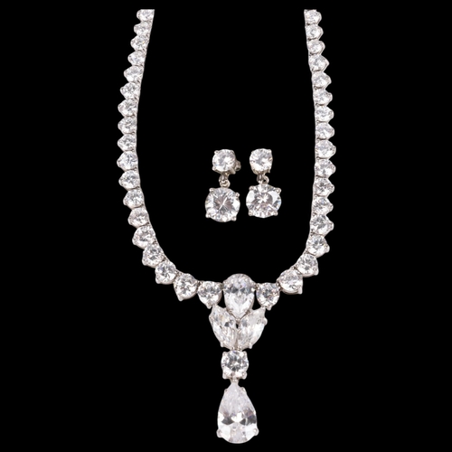 1540 - **Withdrawn** -A sterling silver cubic zirconia necklace and earring set, necklace 40cm, earrings 13... 