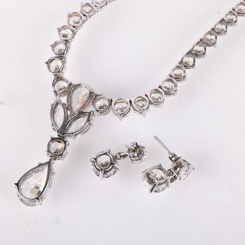 1540 - **Withdrawn** -A sterling silver cubic zirconia necklace and earring set, necklace 40cm, earrings 13... 