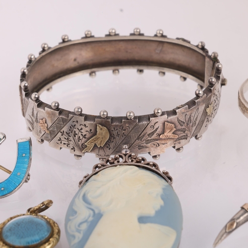 1587 - Various silver jewellery, including hinged bangle, eye cuff bangle, enamel lucky horseshoe brooch, e... 