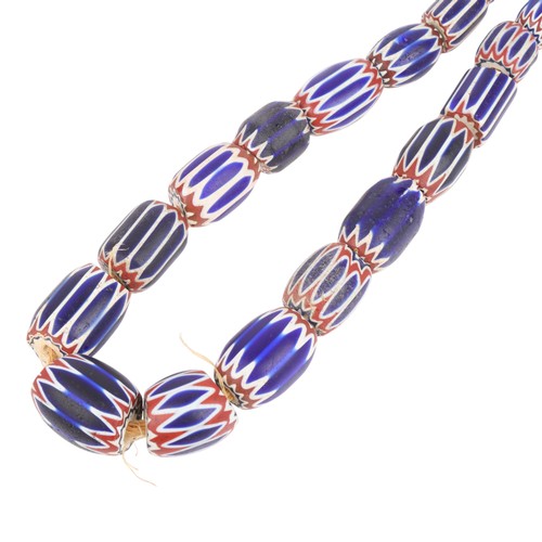 1178A - A large African single-strand graduated chevron/rosetta glass trade bead necklace, including 6 layer... 