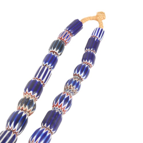 1178A - A large African single-strand graduated chevron/rosetta glass trade bead necklace, including 6 layer... 