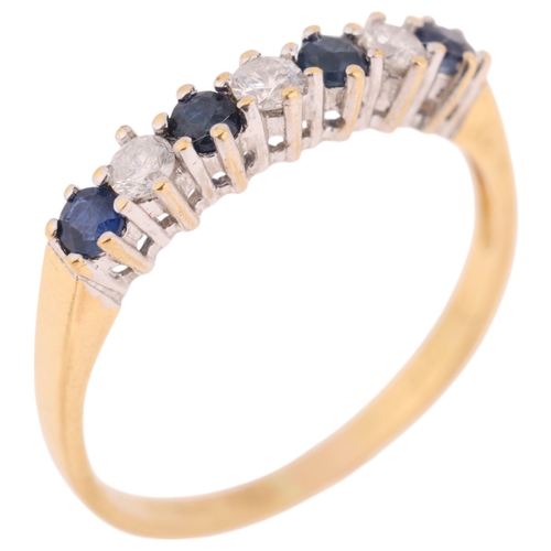 1373 - An 18ct gold seven stone sapphire and diamond half hoop ring, setting height 3.2mm, size Q, 2.2g