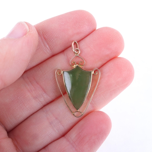 1375 - An Antique 9ct rose gold jade shield pendant, 33.5mm, 1.3g