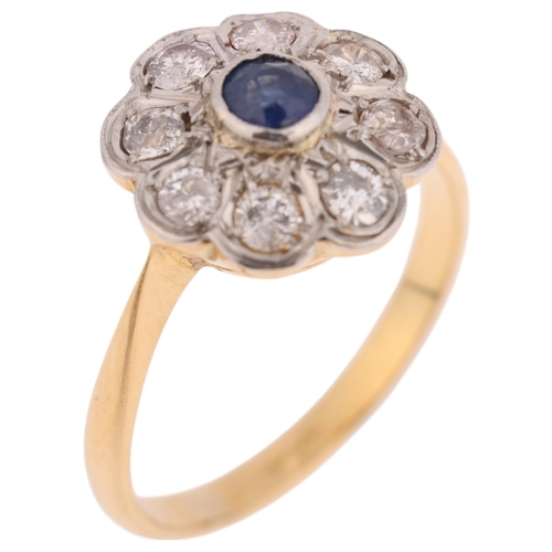 1386 - An 18ct gold sapphire and diamond flowerhead cluster ring, platinum-topped set with round-cut sapphi... 