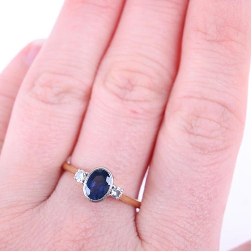 1387 - An 18ct gold three stone sapphire and diamond ring, import hallmarks London 1987, rub-over set with ... 