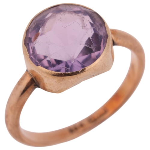 1401 - A 9ct rose gold amethyst dress ring, setting height 10.4mm, size J, 2.8g