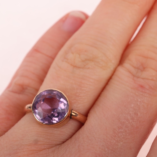 1401 - A 9ct rose gold amethyst dress ring, setting height 10.4mm, size J, 2.8g