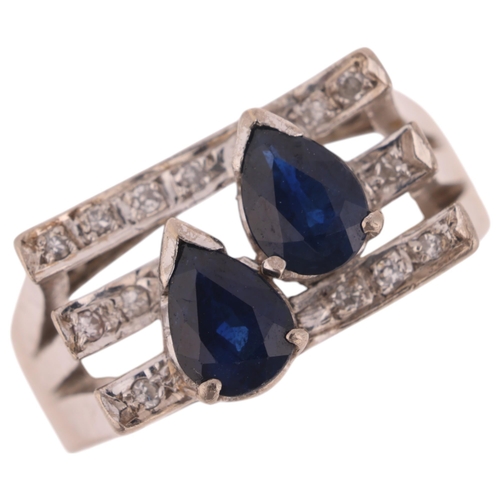 1406 - A 14ct white gold sapphire and diamond cocktail ring, in the Art Deco style, set with pear-cut sapph... 