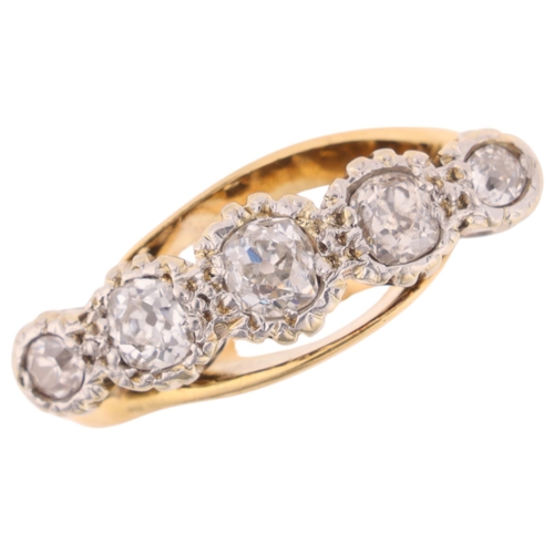 1407 - An 18ct five stone diamond crossover ring, illusion set with old-cut diamonds, total diamond content... 