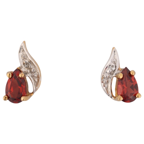 1418 - A pair of 9ct gold garnet and diamond stud earrings, 8.8mm, 0.6g