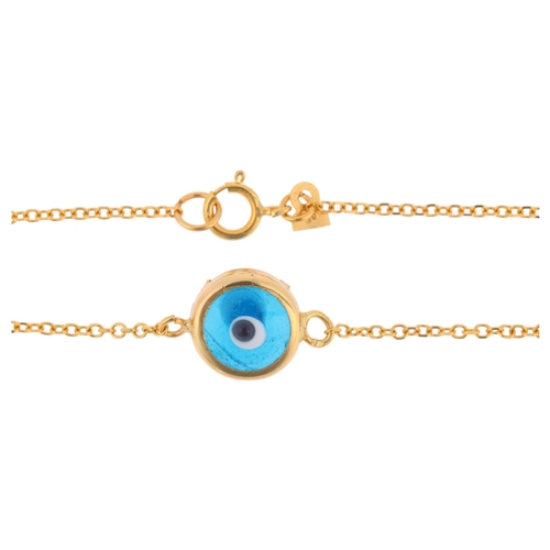 1425 - A 14ct gold blue glass 'Evil Eye' bracelet, 16cm, 1.3g