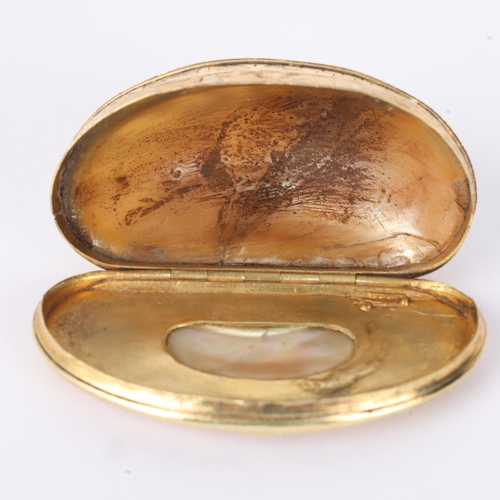 1603 - A George II silver-gilt mounted shell snuffbox, circa 1730, engraved foliate decoration, 7cm