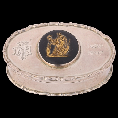 1606 - An Edwardian silver box, Cohen & Charles, Chester 1906, oval form with inset Jasperware plaque and r... 