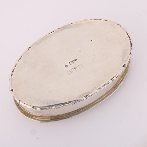 1606 - An Edwardian silver box, Cohen & Charles, Chester 1906, oval form with inset Jasperware plaque and r... 