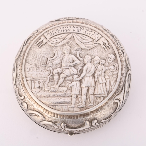 1607 - An Antique Dutch silver pillbox, circa 1900, circular form with relief embossed figural decoration a... 