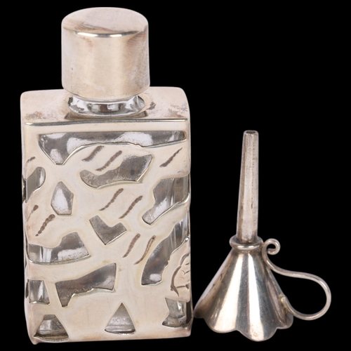 1610 - A modern sterling silver-mounted glass travelling perfume bottle, and matching refill funnel, bottle... 