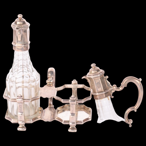 1630 - A George II silver 2-bottle cruet set, William Gould, London 1735, with fitted glass cruet bottles (... 