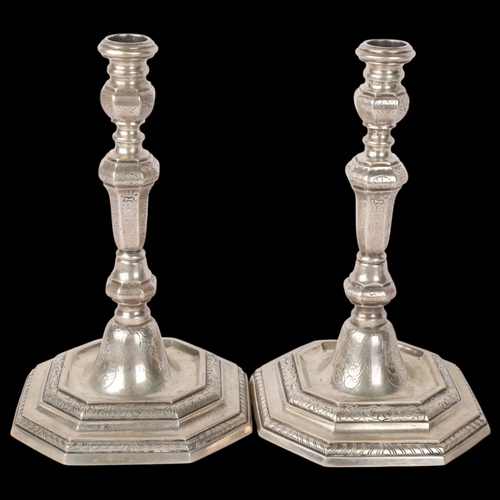 1652 - A pair of Antique Continental silver table candlesticks, engraved foliate decoration,  with octagona... 