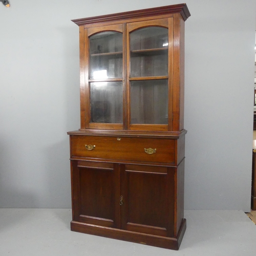 2115 - A late Victorian mahogany two section secretaire bookcase, with two glazed doors, secretaire drawer ... 