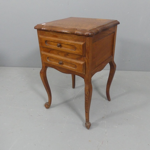 2127 - A French oak 2 drawer bedside chest. W39cm, H62cm, D37cm.