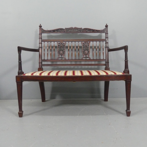 2128 - An Edwardian two-seater mahogany and upholstered loveseat. Width 102cm, height 92cm, depth 56cm.