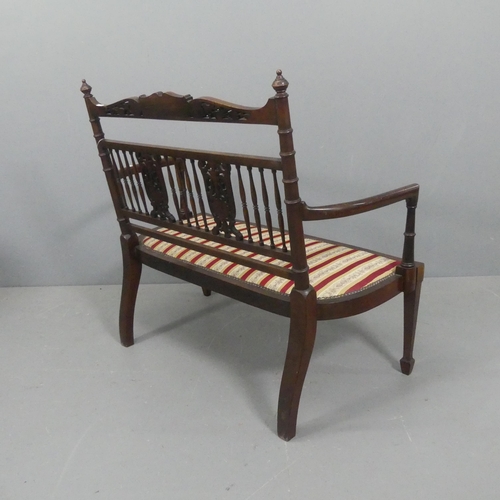 2128 - An Edwardian two-seater mahogany and upholstered loveseat. Width 102cm, height 92cm, depth 56cm.