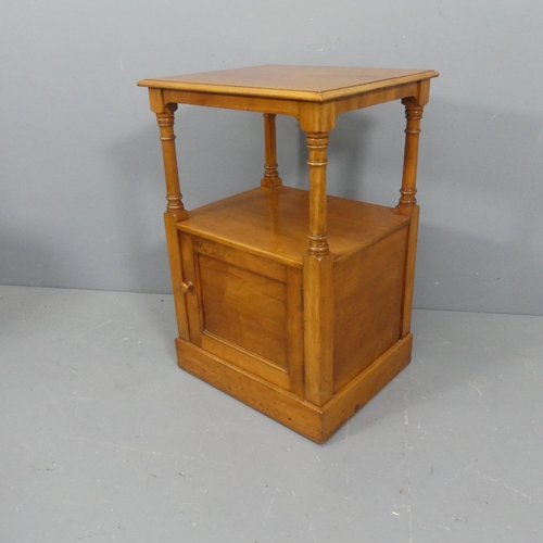 2130 - A mahogany two-tier lamp table with cupboard under. Width 51cm, height 76cm, depth 43cm.