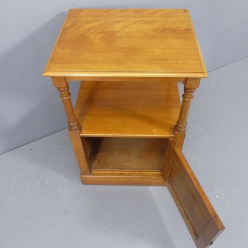 2130 - A mahogany two-tier lamp table with cupboard under. Width 51cm, height 76cm, depth 43cm.