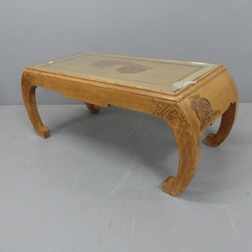 2160 - A Chinese hardwood opium table, with inset glass top and carved decoration. Length 101cm, height 41c... 