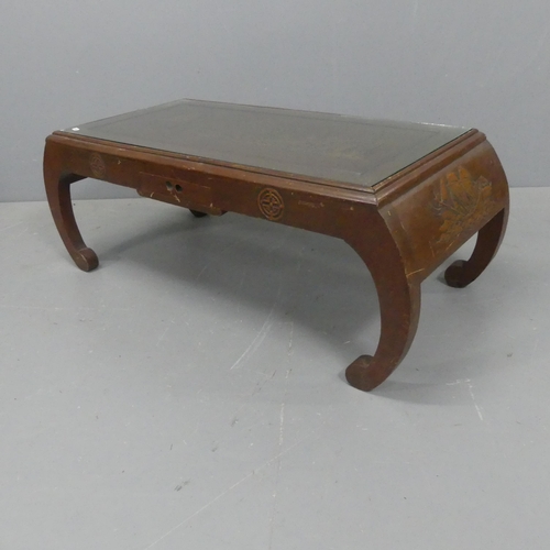 2161 - A Chinese hardwood opium table, with inset glass top and carved decoration. Length 102cm, height 37c... 