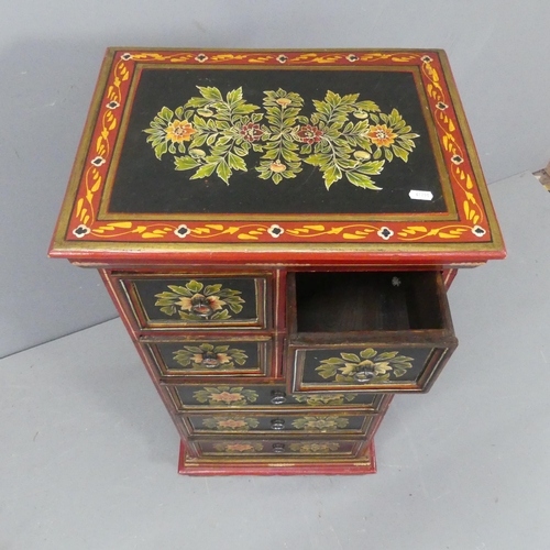 2177 - A modern folk-art painted eastern European style narrow chest of seven drawers. Width 49cm, height 1... 