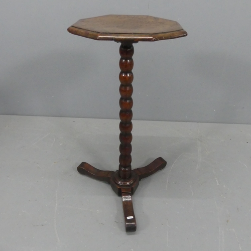 2184 - A 19th century burr-walnut veneered octagonal wine table, on mahogany bobbin turned central column w... 