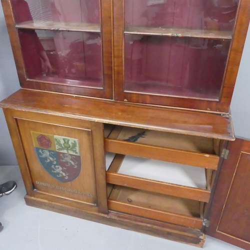 2187 - A Victorian mahogany two section library bookcase, bearing the arms of Pembroke College, Oxford and ... 