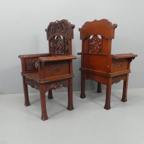 2195 - A pair of red-lacquered Chinese Qing dynasty style throne chairs, with carved and pierced blossom an... 